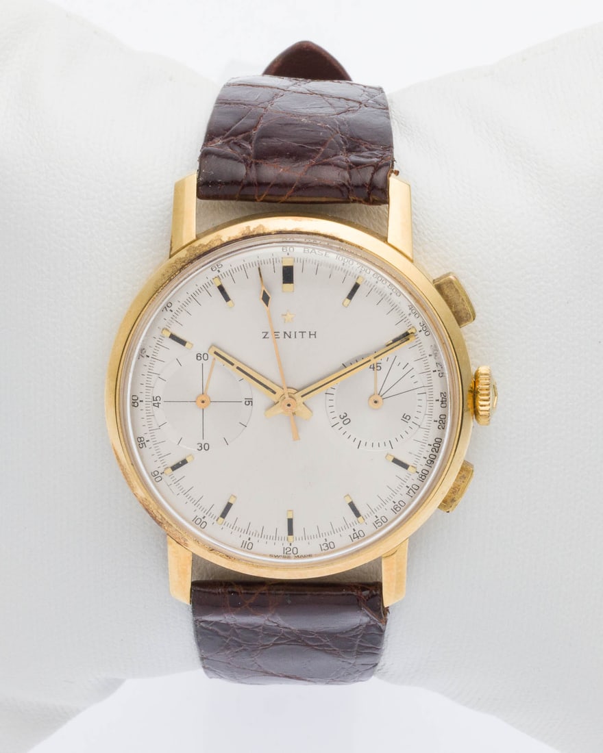 Zenith Chronograph Men's 18K Gold Watch: Property from a Private Collection, Savannah, GA Description: Zenith Chronograph Men's 18K Gold Watch, with white face featuring chronograph movement with two sub dials, in a yellow gold case marked