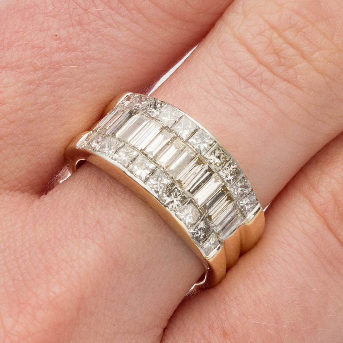 Baguettes and Princess Cut Diamond 14K Band, Sz 7.5: Description: Baguettes and Princess Cut Diamond and 14K Band, Size 7.5, featuring two rows of princess cut diamonds framing a row of baguettes (approx. 2.5 cts, F-G, VS1-SI) invisible set in 14K