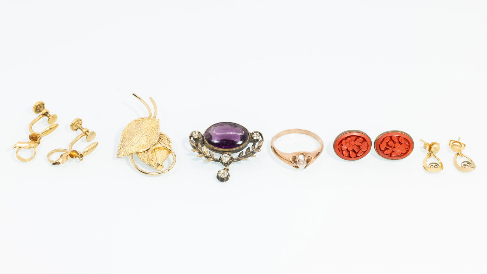 Five Gold Filled Articles and 14K Vintage Mood Ring: Property of a Private Collector, Savannah, GA Description: Five Gold Filled Articles and 14K Vintage Mood Ring, comprising a 14K rose gold mood ring, size 7 (marked '14K'); a pair of gold filled