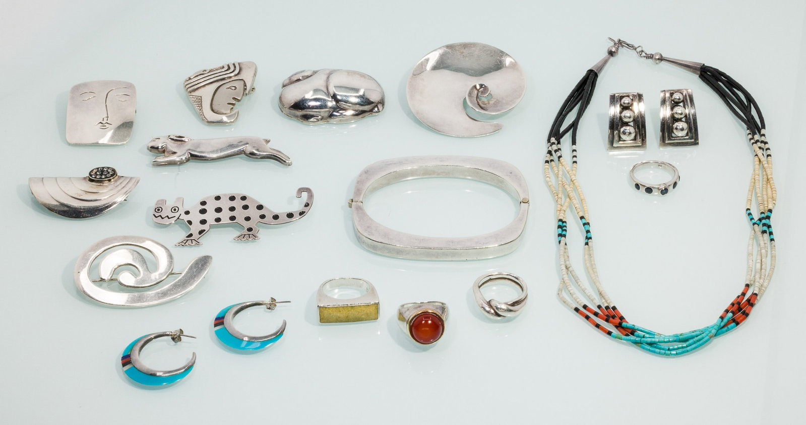 Group of Silver and 14K Gold Jewelry, 16 pcs.: Property of a Private Collector, Savannah, GA Description: Group of Silver and 14K Gold Jewelry, 16 pcs., comprising an 18 in. multistrand beaded necklace with silver hardware (unmarked); a