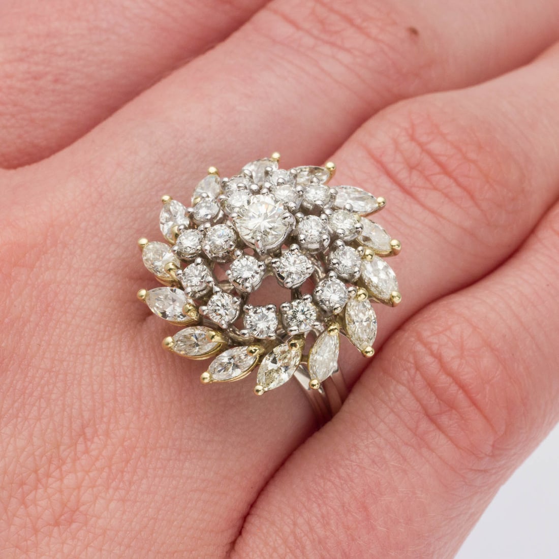 Diamond and 14K Pinwheel Ring, Size 6.25: Description: Diamond and 14K Pinwheel Ring, Size 6.25, featuring two rows of round brilliant diamonds, with central round brilliant (approx. 4.2 mm) and outer ring of marquise (approx. 4.5 cts