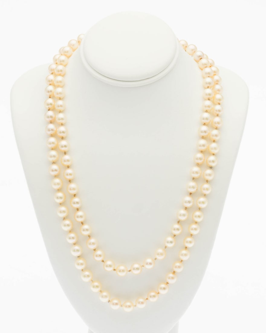 6 mm Pearl Necklace, 31 in.: Property from a Private Collection, Jacksonville, FL Description: 6 mm Pearl Necklace, 31 in., strung with approx. 6 mm pearls with 14K yellow gold hook and box clasp, marked '14K'. Measurements: