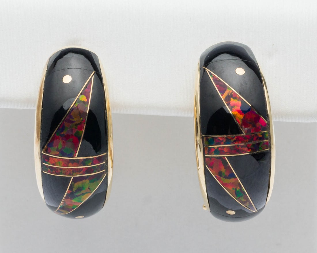 14K Gold Onyx and Red Opal Earrings: Description: 14K Gold Onyx and Red Opal Earrings, each inlaid with black onyx, red opal and yellow gold, with clip and post backs, marked '14KT' on clips. 9.55 grams overall. Measurements: Height: