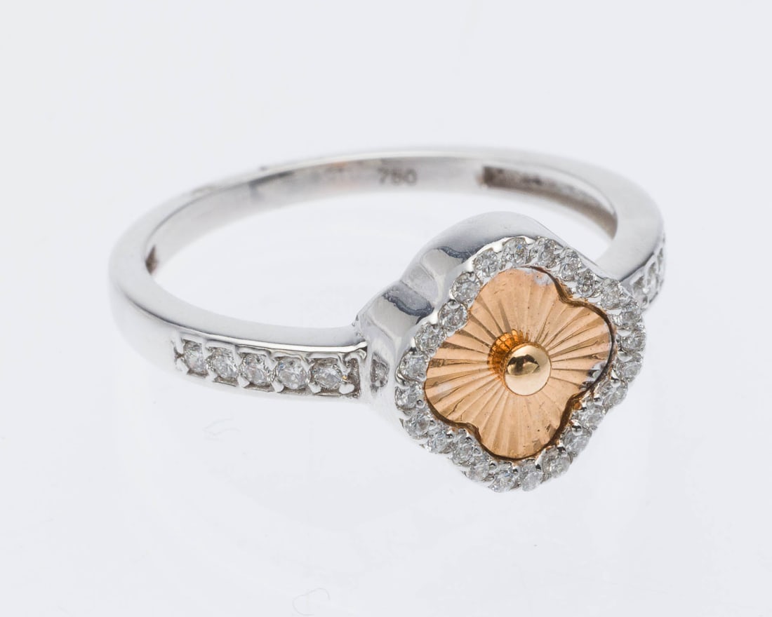 18K Gold and Diamond Ring, Size 8.5: Description: 18K Gold and Diamond Ring, Size 8.5, featuring a rose gold clover design with numerous pave set round diamonds (approx. 0.26 carat diamonds VS-F), marked '750' on inside of band. 3.2