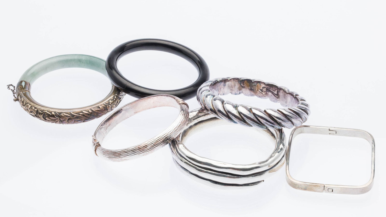 Six Sterling Silver and Stone Bangle Bracelets: Property from a Private Collection, Savannah, GA Description: Six Sterling Silver and Stone Bangle Bracelets, comprising a square sided hinged sterling bangle (marked '925, TF-30, Mexico', 0.98 tr