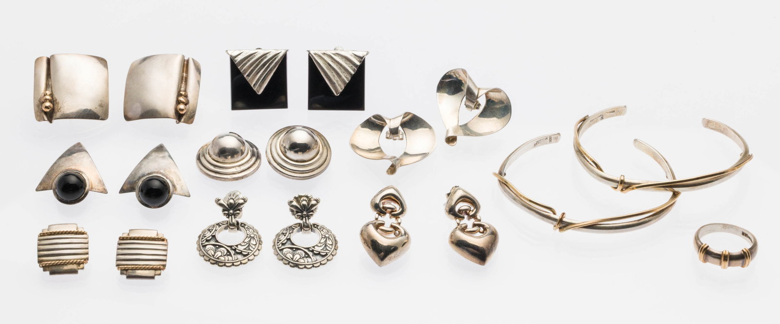 Group of Silver Jewelry, 11 pcs.: Property from a Private Collection, Savannah, GA Description: Group of Silver Jewelry, 11 pcs., comprising two sterling silver and 12K gold filled cuff bracelets (marked 'Sterling, 12K GF, JOR');