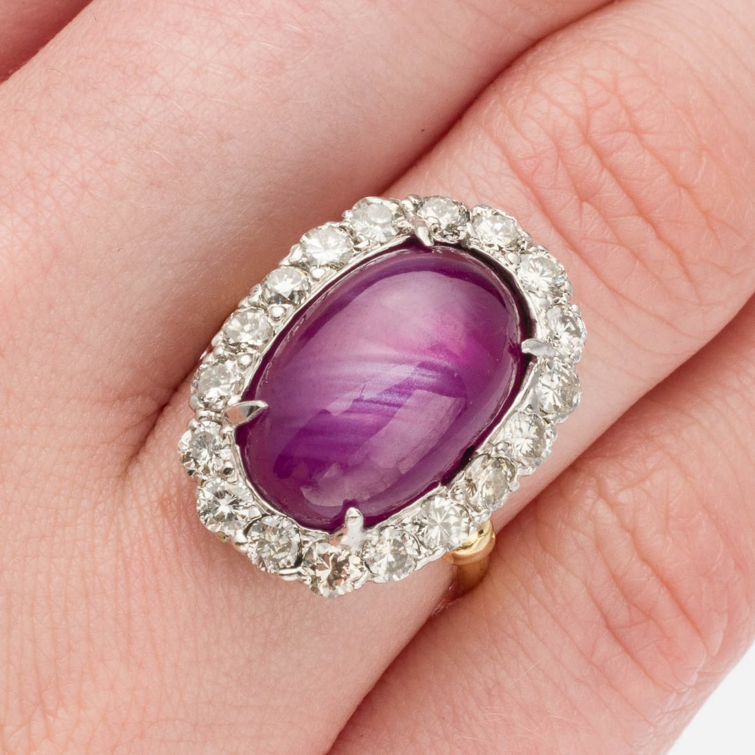 Natural Ruby Star, Diamond, 14K & Platinum Ring Sz 6: Description: Natural Ruby Star and Diamond, 14K and Platinum Ring, Size 6, featuring oval ruby star cabochon (approx. 12-15cts) framed by round cut diamond (approx. 1.2 cts, G-H, VS) mounted in 14K