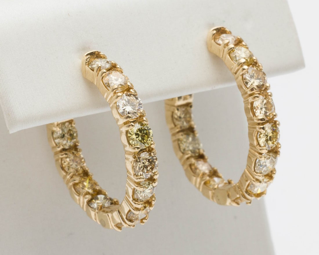 Fancy Yellow Diamond and 14K Gold Hoop Earrings: Description: Fancy Yellow Diamond and 14K Gold Hoop Earrings, featuring round brilliant yellow diamonds of various saturations (approx. 2.70 cts, 3 mm) bead set in 14K yellow gold hoop earrings, with