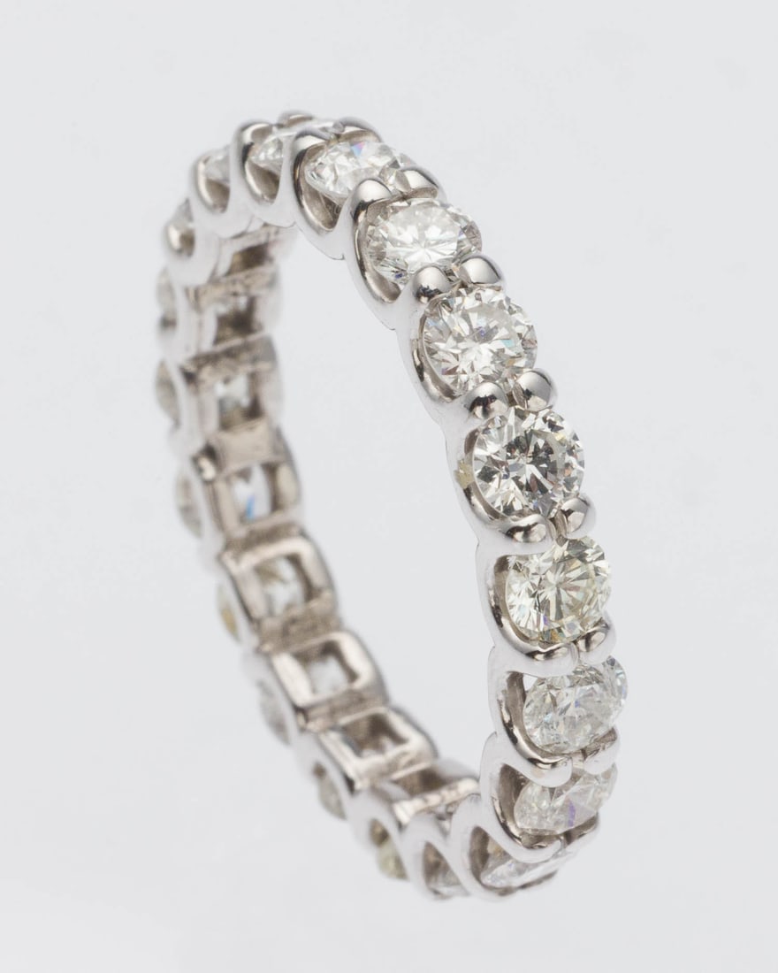 Diamond Infinity 14K Band (2 cts), Size 4.25: Description: Diamond Infinity 14K Band (2 cts), Size 4.25, full band set with approx. 2 cts, F-G, SI, round diamonds, unmarked but tests 14K. 2.5 grams. Measurements: Size: 4.25