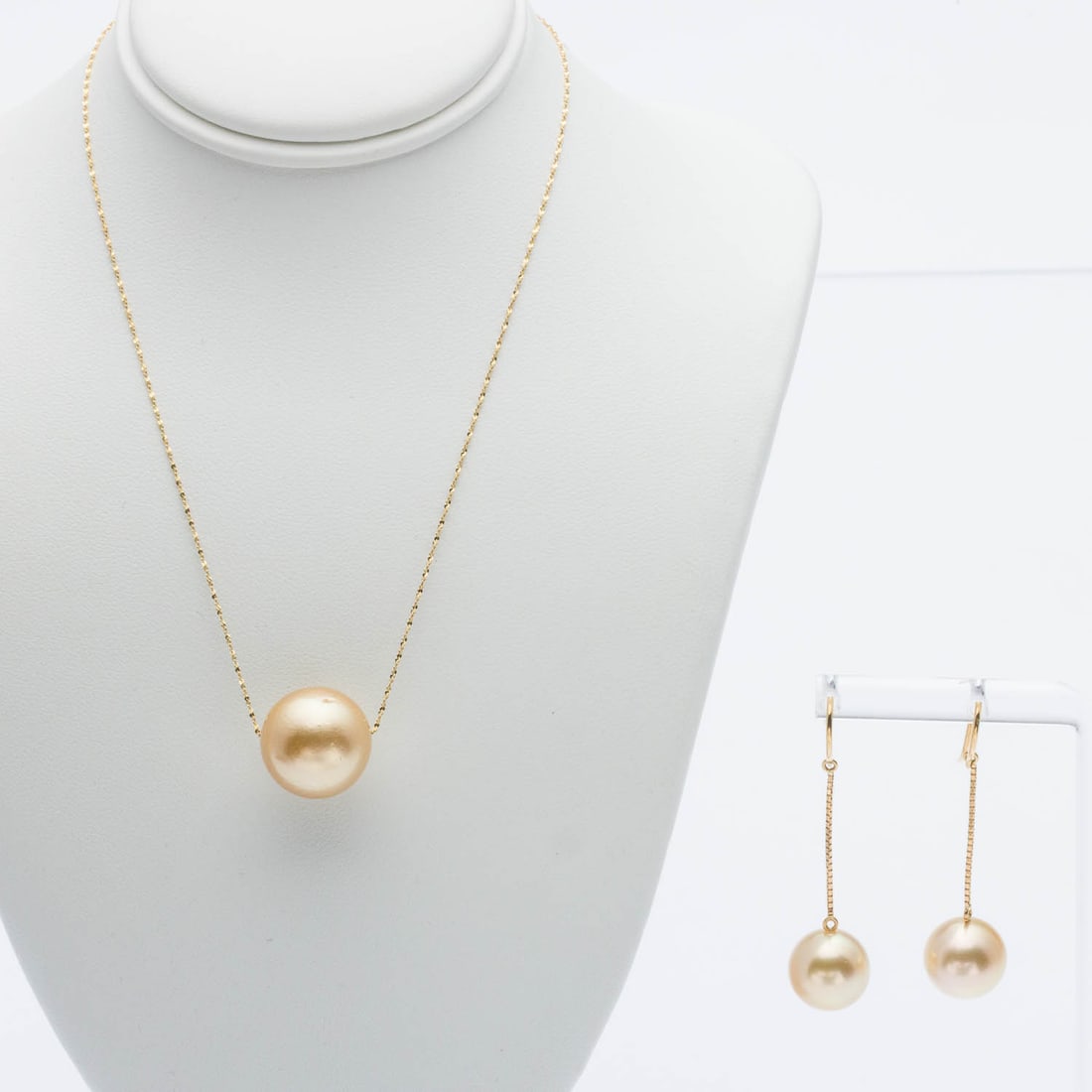 Golden South Sea Pearl and 14K Necklace & Earrings: Description: Golden South Sea Pearl and 14K Necklace with Matching Earrings, an approx. 14mm golden South Sea pearl strung on a 14K yellow gold chain with claw clasp, marked 'Italy, 14K' (5.39 grams