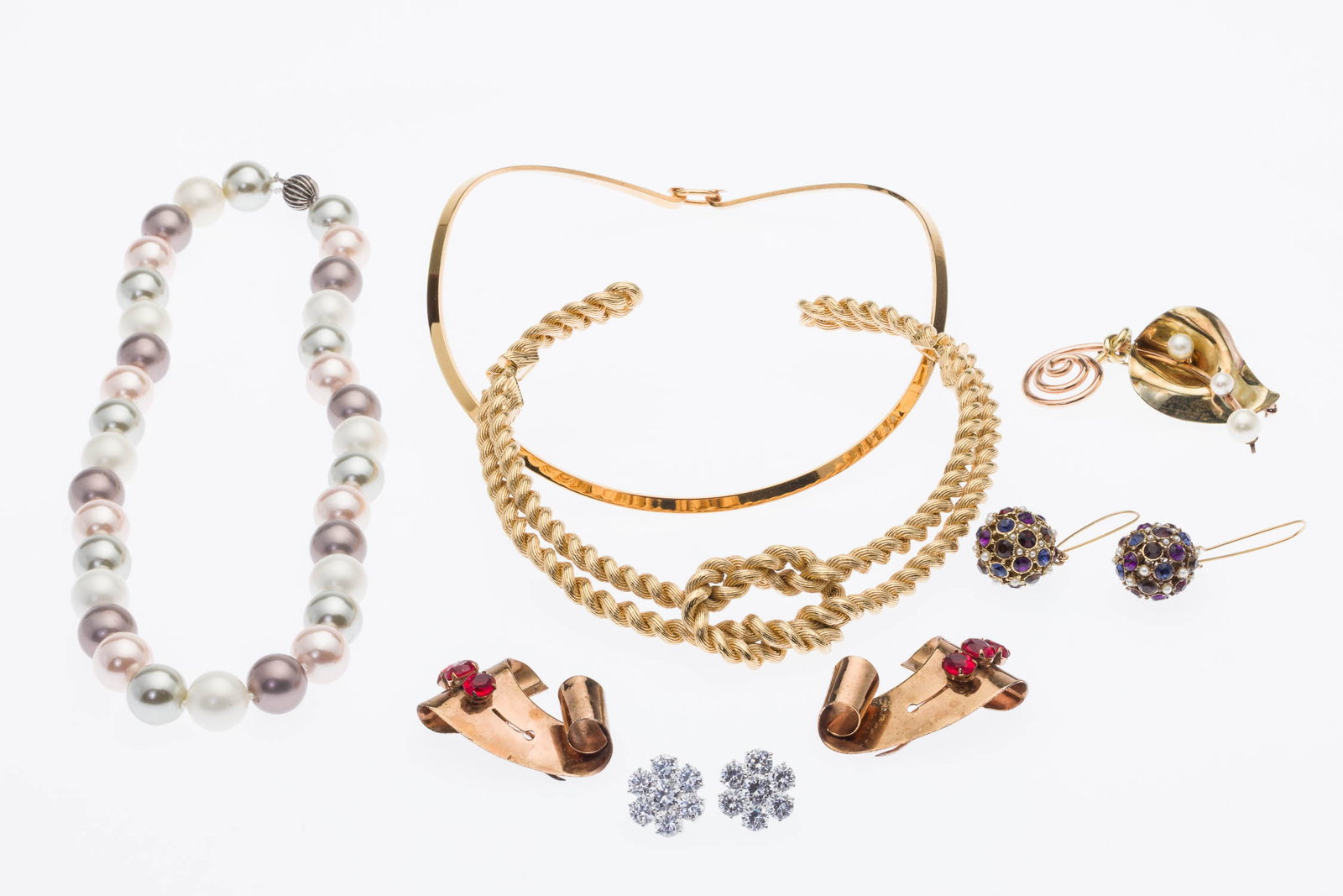 Group of Costume Jewelry, Including Givenchy, 7 pcs: Property from a Private Collection, Jacksonville, FL Description: Group of Costume Jewelry, Including Givenchy, 7 pcs, comprising a Givenchy gold-tone knot design cuff necklace (marked on back); a