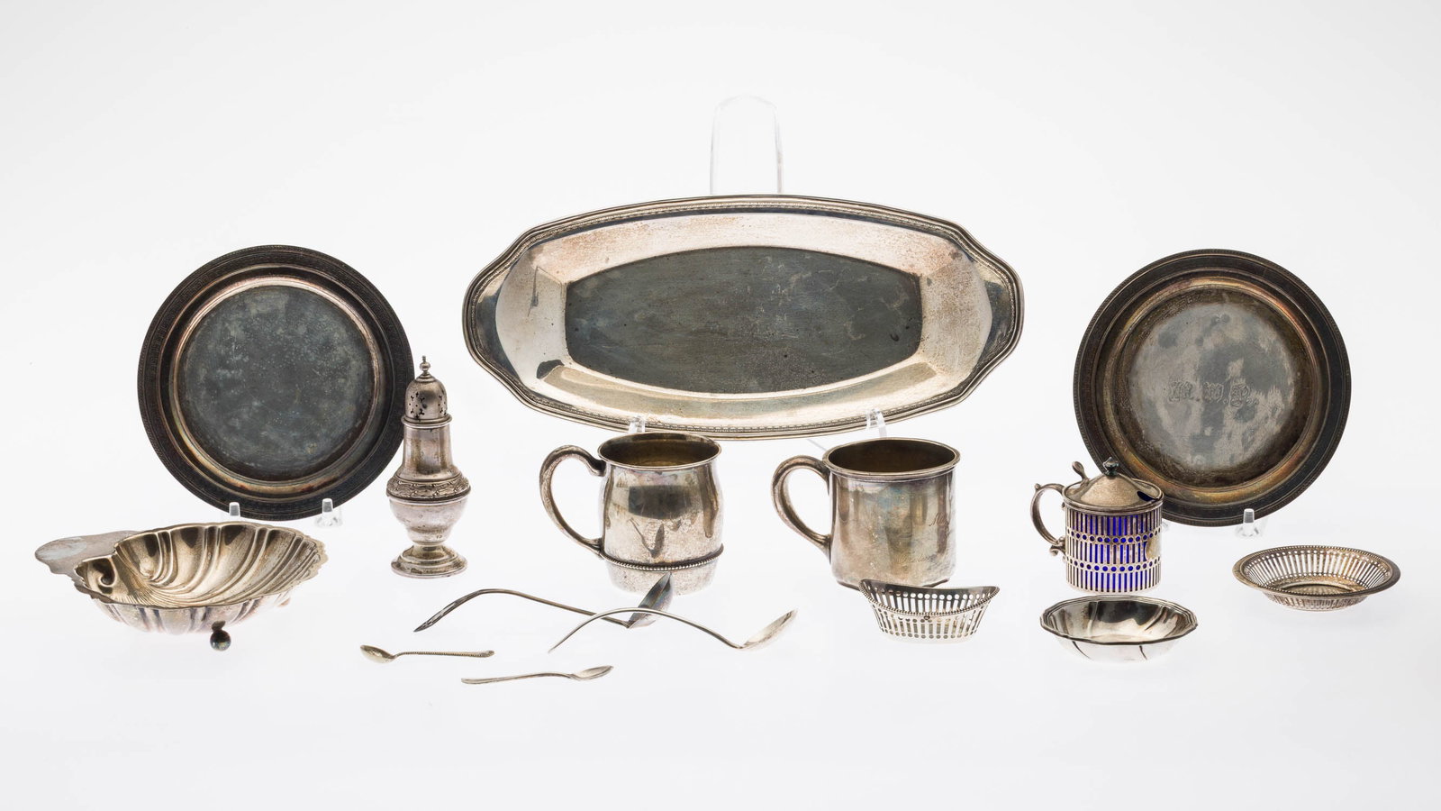 Misc. group of Sterling Silver, 13 pcs.: Property of Bliss Hebert and Allen Charles Klein Description: Misc. group of Sterling Silver, 13 pcs., comprising a monogrammed mustard pot with 2 small spoons, two baby mugs including Gorham,