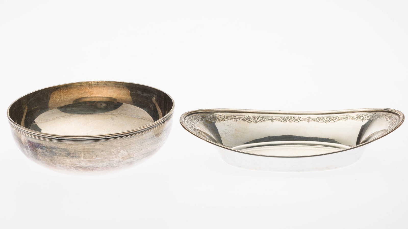 2 Sterling Silver Tiffany Bowls: Property of a Private Collector, St. Simons Island, GA Description: 2 Sterling Silver Tiffany Bowls, comprising sterling silver hexagonal bowl, and small bread bowl, monogrammed; both dated between