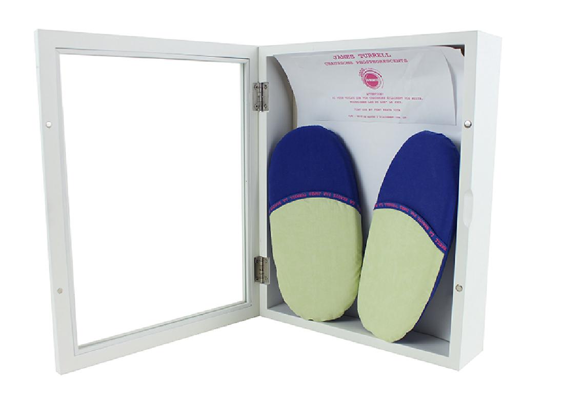 James Turrell (b. 1943) Californian: CHASSONS PHOSPHORESCENTS, 2000, glow-in-the-dark fabric slippers with paper multiple, created for festival La Beaute in Avignon France 2000, in wood display case, overall 15 ¼ x 12 ¼ x 3 ¾”, in a