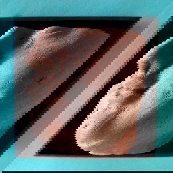 Greco-Roman Ceramic: Hellenic period, partial face fragment, 1 ¾" tall, with base. From a Private Collection, Beverly Hills.