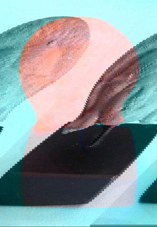 Greco-Roman Ceramic: Head fragment, 1 ¾" tall, with base. From a Private Collection, Beverly Hills.