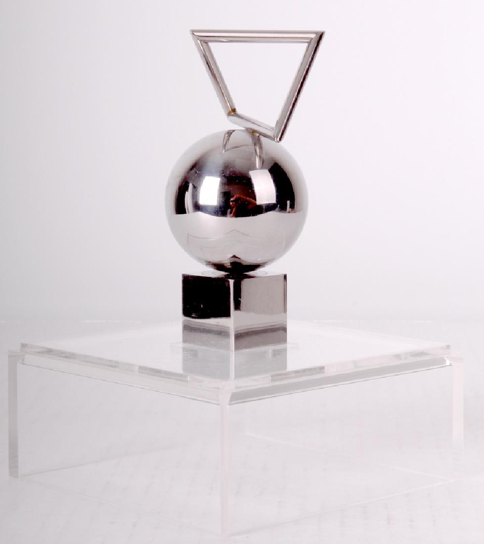 Yaacov Agam (b. 1928) Israeli: PETIT OEIL COSMIQUE (Cosmic Eye), chrome plated metal magnetic kinetic sculpture, stamp signed and numbered 549/900A, published by Artcurial, height 4”, overall 5 ½ x 4 x 4” in Plexiglas display 