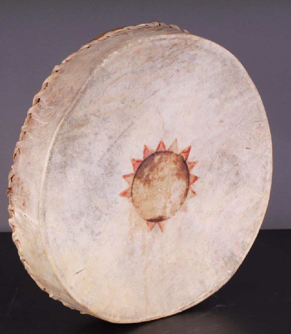 Southwestern Art: Native American Drum, Northern: Ceremonial Drum, circa 1890, made of wood and rawhide, 3â€ deep, 15â€ diameter.