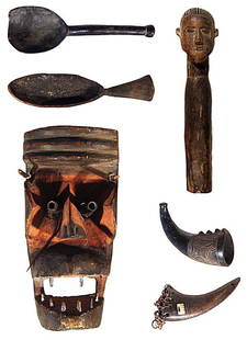 African Sculpture (six): A pair of carved wood spoons, 13 ½" & 16 ½" long, both with natural wear associated with age, otherwise in good condition; DAN GERE LIBERIA, carved wood mask with some hand-painting, 11" tall, 5