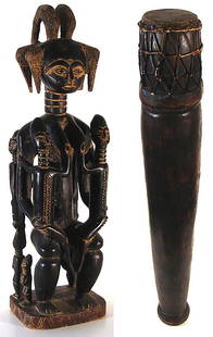 African Sculptures (two): FEMALE FIGURE ENTHRONED WITH CHILDREN, carved wood figure, 31 ½" tall; Carved wood drum, 51" tall, small hole in pad. (2)