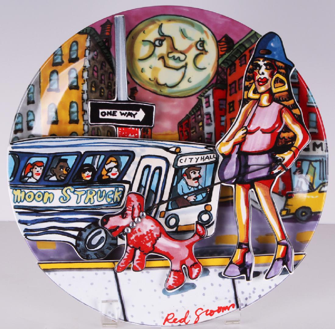 Red Grooms (b. 1937) American: MOONSTRUCK, three-dimensional enameled porcelain plate with rhinestone and plastic rope attachment, signature in design on recto and verso, from a limited edition numbered 916 in 24 karat gold on vers