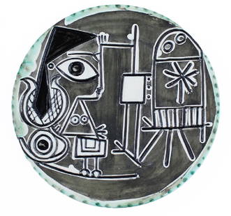 Pablo Picasso (1881-1973) Spanish: JACQUELINE AT THE EASEL (AR.333), 1956, painted and glazed ceramic charger, numbered 32/200 with Original de Picasso and Madoura stamps on verso, 16 ½” diameter, peg supported not mounted in a Plex