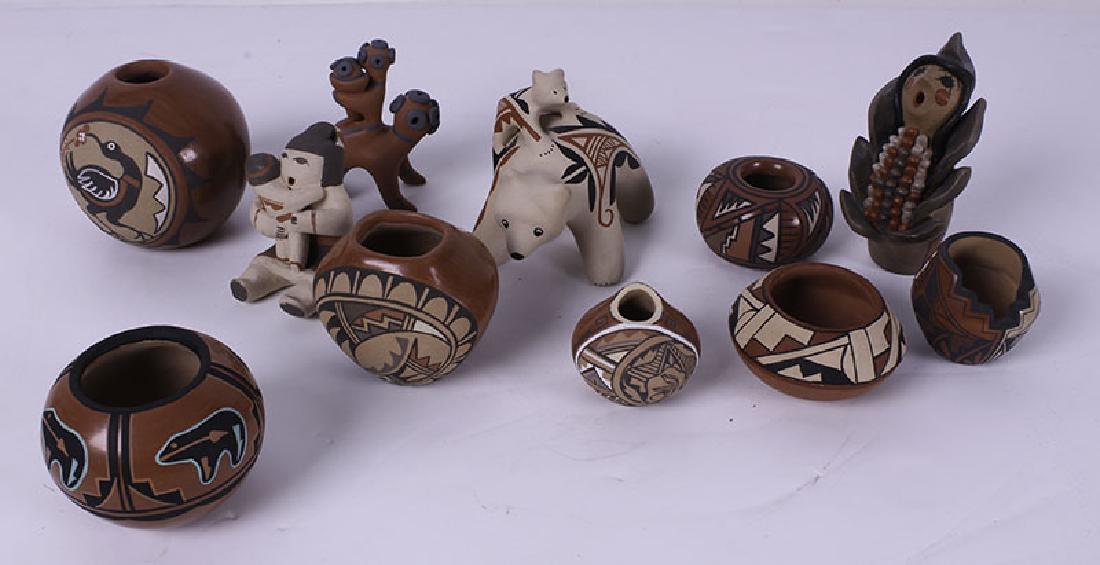 Native American Pottery: Jemez (eleven): A collection of eleven miniature painted ceramic vessels and figurines, artist’s include Dory Sandia, Rachel Loralto, Theresa Osos, L. Jemenez, J. Toya, all signed underneath, sizes from 3” to 1 �