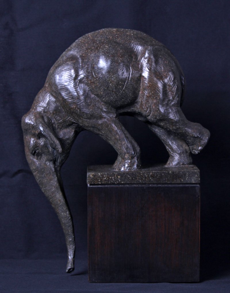 Dan Ostermiller (b. 1956) Wyoming: ELEPHANT, 1989, cast bronze sculpture with green marble patina, signed and dated and numbered 7/20, overall 13 x 9 ½ x 5” including wood base