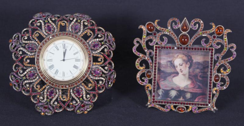 Decorative Arts: Jay Strongwater design (two): DESK CLOCK & PICTURE FRAME, each enamel and decorated metal, hallmarked, 4 ½” diameter & 4 ¼ x 4 ½”. (2)