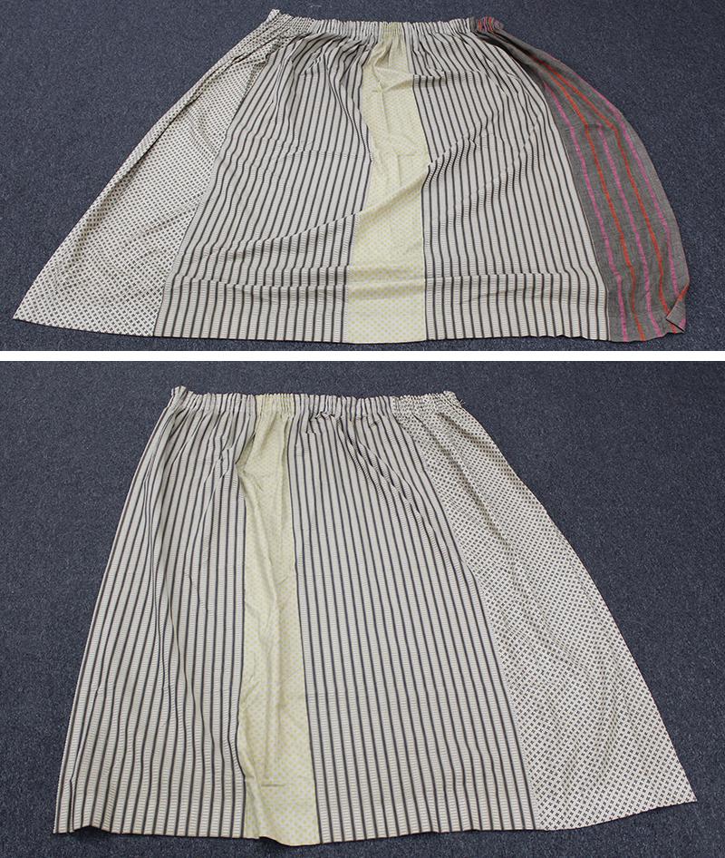 Alexander Girard Designs for Herman Miller (two): A linen curtain panel 80” long, overall 46” gathered at top and 94” stretched at bottom, A curtain panel, 80” long, overall 50” gathered at top and 79” stretched at