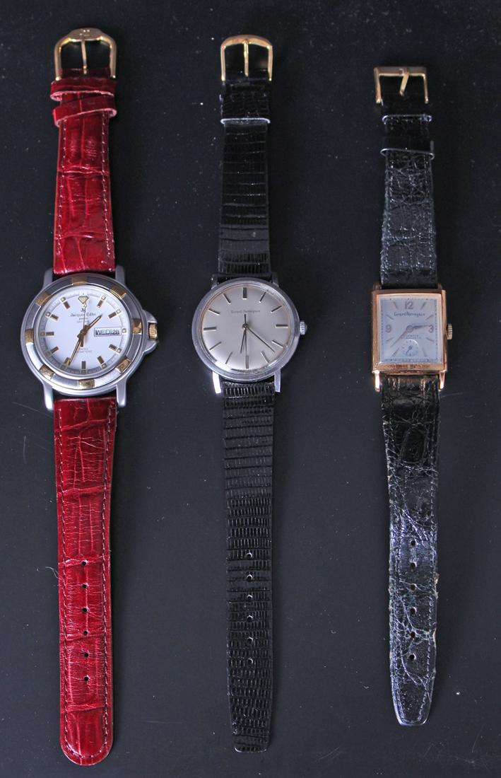 Girard Perregaux (2) & Jacques Edho Paris (three men’s: Girard Perregaux 17 Jewel Chronometer watch with gold (plate?) body and leather band, Geneve Switzerland; Girard Perregaux stainless steel watch with leather band; Jacques Edho stainless steel watch w