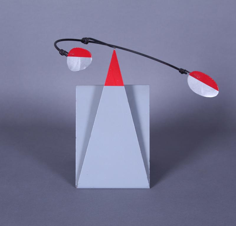 Brad Howe (b. 1959) California: FOLDED GREY WITH BALANCING RED ARC, cut and painted metal sculpture, signed, 9 x 9 x 8”. Acquired directly from artist by current owner.