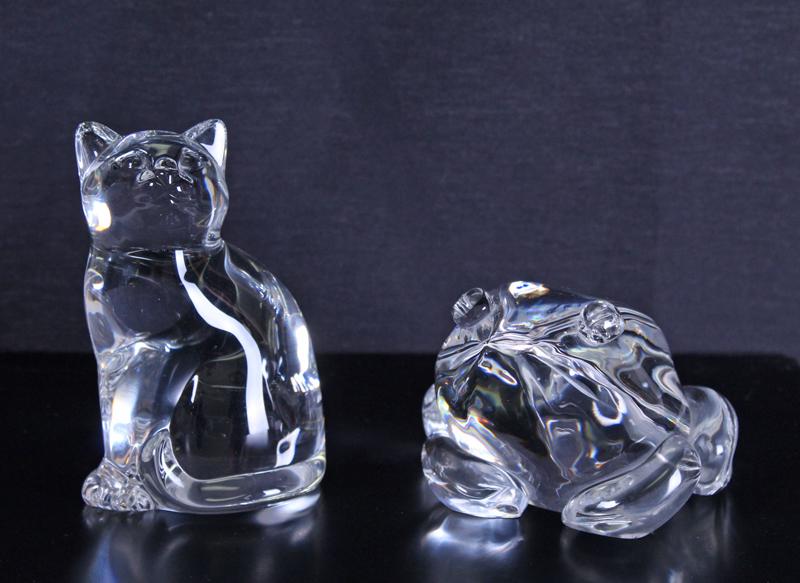 Steuben Glass by Lloyd Atkins (Frog) (two): CAT WITH CURLED TAIL; FROG, art glass, both inscribed Steuben underneath, Cat 4 ¼ x 3 x 2 ½”, Frog 2 ¾ x 4 ¾ x 4”. (2)