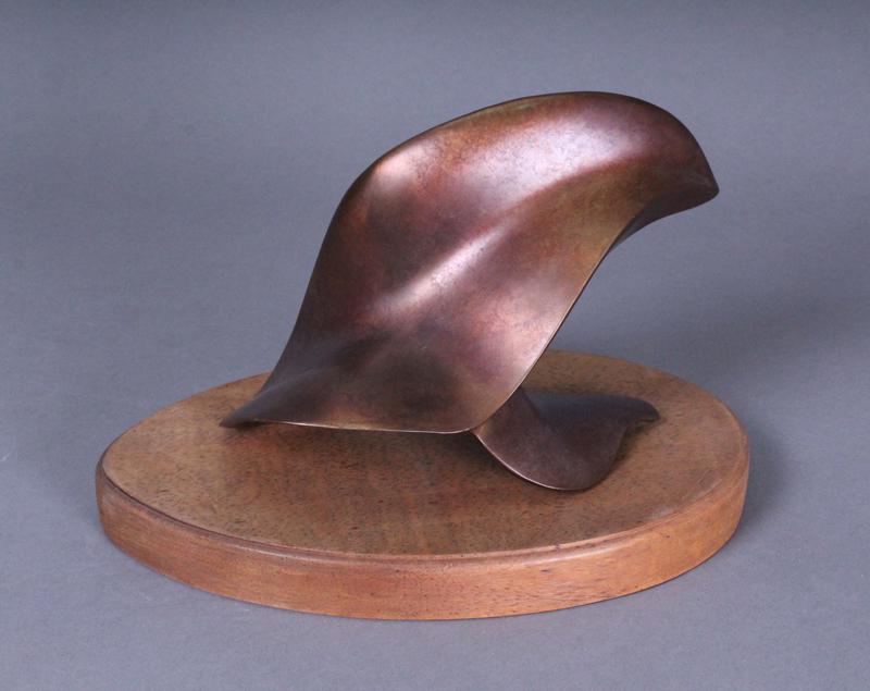 Ken Wiese (20th Century) Carmel: UNTITLED in the style of Jean Arp, cast bronze sculpture, 5 x 6 ½ x 4”, with signed 1 x 9 ¼ x 6” wood stand.
