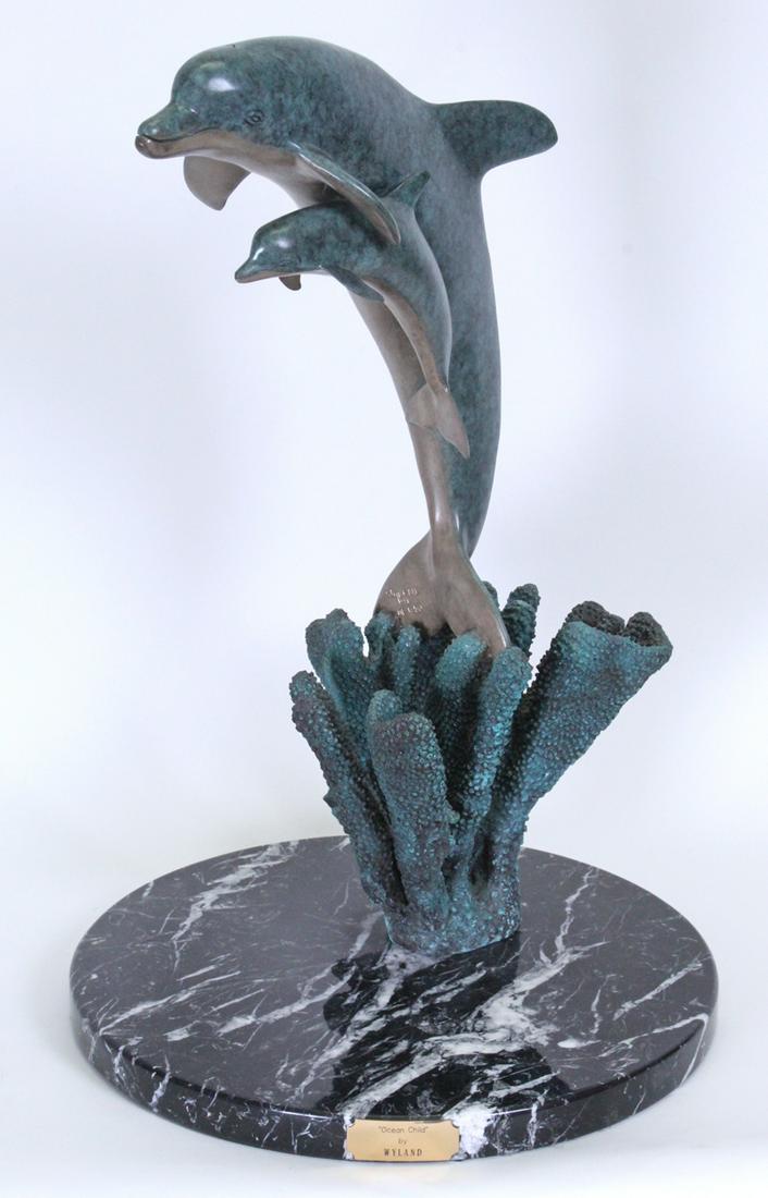 Robert Wyland (b. 1956) California Hawaii: OCEAN CHILD, 1991 cast bronze sculpture with color patina, signed and numbered AP 1/50 (artist’s proof), 24 x 18 x 16” including marble base, 63 pounds, with a signed book of the artist. Provenanc