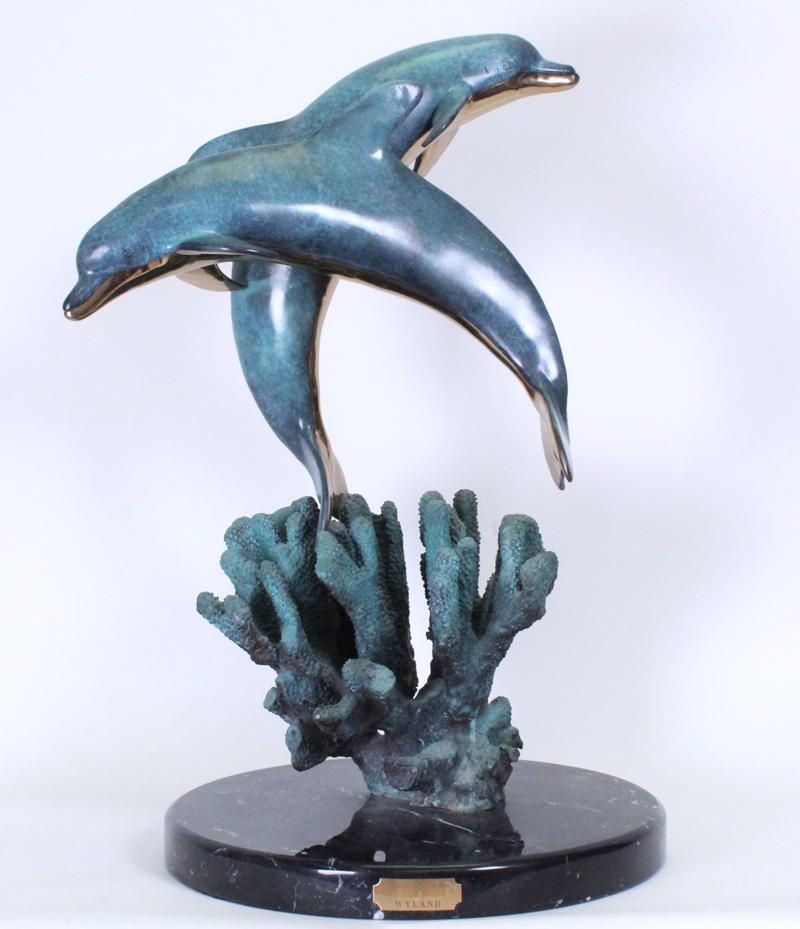 Robert Wyland (b. 1956) California Hawaii: CHILDREN OF THE SEA, 1990, cast bronze sculpture with color patina, signed and dated and numbered AP 31/50 (artist’s proof), 27 x 19 x 16” including marble base, 93 pounds, with a signed book of t