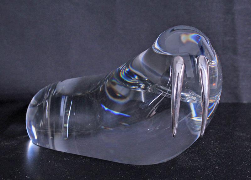 Steuben Glass by Paul Schultz: WALRUS, art glass with sterling silver tusks, inscribed Steuben underneath, 4 x 7 ½ x 4”.