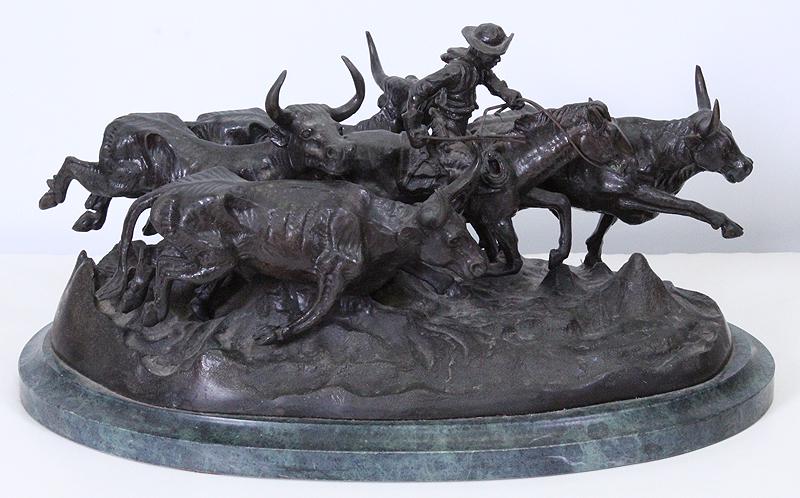 after Frederic Remington (1861-1909) American: STAMPEDE, cast bronze sculpture, signed in the design and numbered 1/5, on green marble base overall 10 x 19 x 11 ½”, weight 58 pounds. From the estate of Elmer Baker.