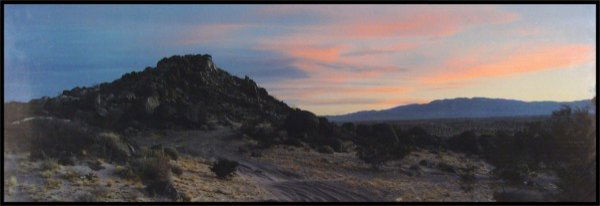 John Divola (b. 1949) American: DESERT LANDSCAPE, 1999, color c-print, signed and dated and inscribed 'RTP', 16 ½ x 39", printed by Muse X, a few soft handling creases, otherwise in good condition.