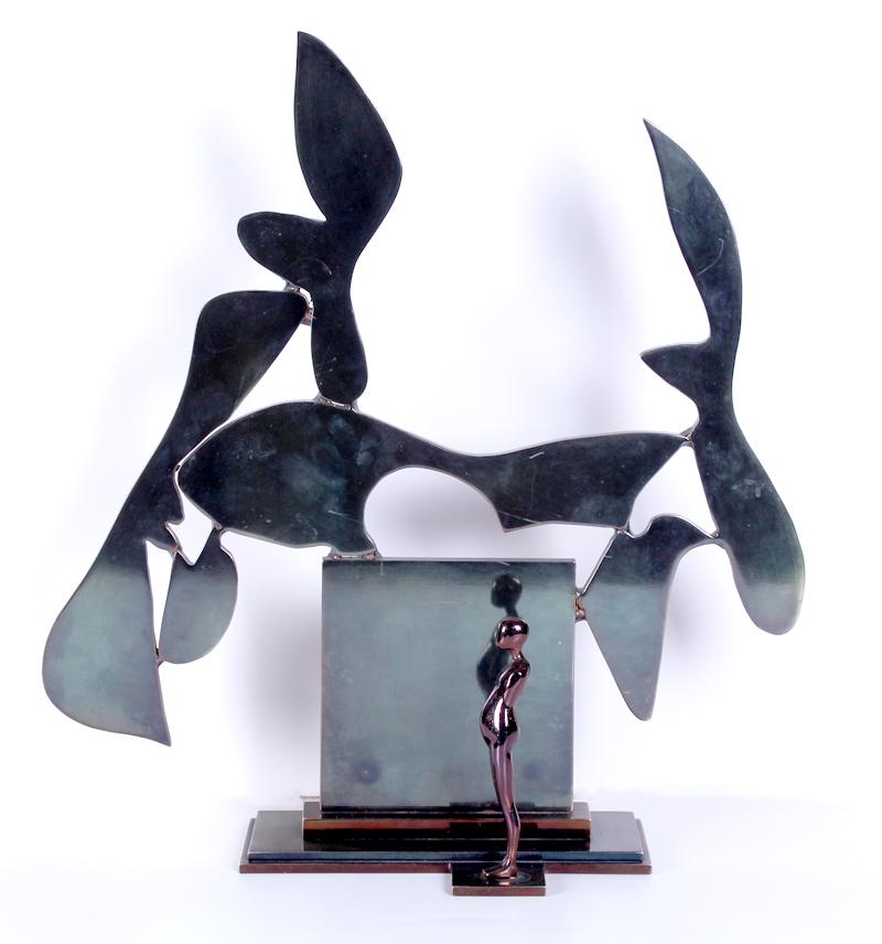 Ernest Trova (1927-2009) Missouri: UNTITLED STANDING FIGURE IN FRONT OF A SCULPTURE, 1978, metal sculpture, signed and dated and with insignia underneath, 19 x 17 ½ x 6”, weight 22 lbs. From the Stuart Lampert & Stephen Toma