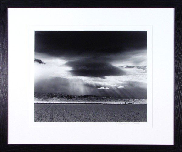 Roman Loranc (20th Century) Californian: VALLEY BEFORE THE RAIN, WESTLY, 2001, silver gelatin print, signed lower right, titled and signed on verso & numbered 2/50, framed with glass.