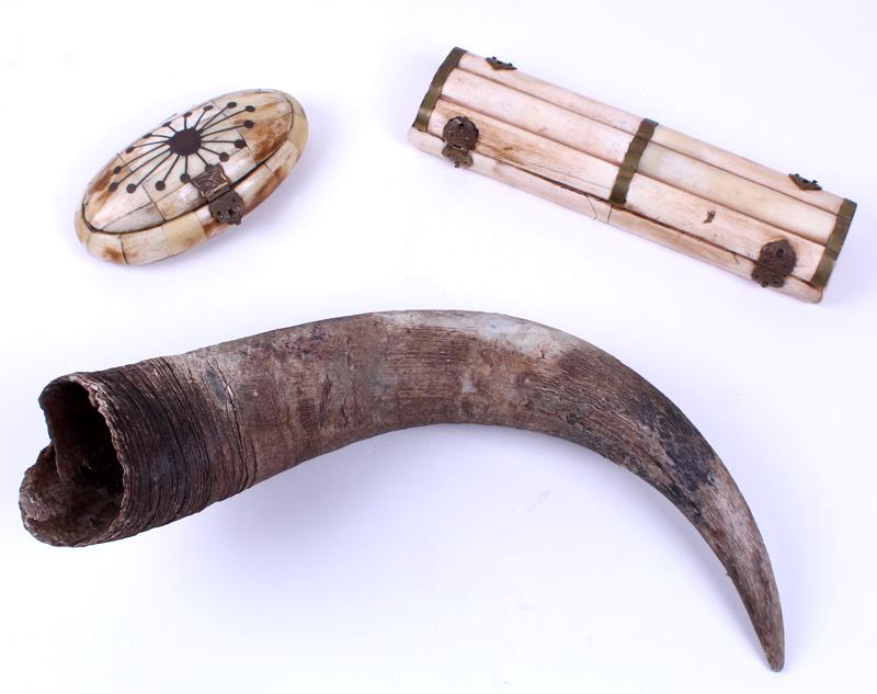 Ethnic Bone Boxes & a Ram’s Horn (three): Cut and laminated bones with brass hardware and velvet-like lining inside, one with metal inlay, 1 ¾ x 9 ¾ x 2 ½” & 2 x 6 x 3”; Together with a 15” long ram’s ho