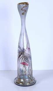 Erwin Eisch (b. 1927) German: Tall iridescent glass vase with flared rim and painted dragonflies and flowers and leave design, signed and dated 85’ underneath, 17 ¼” tall, 5” dimeter. From the estate of Leon