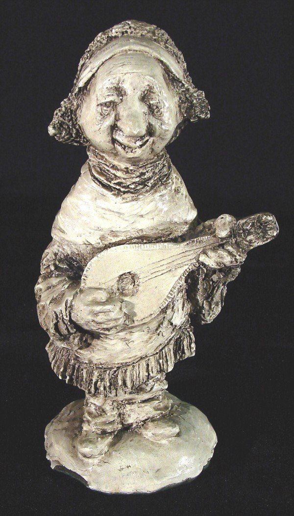 Charles Bragg (b. 1931) American: MANDALIN PLAYER, painted plaster sculpture, 6 ½" tall, some small chips and soiling, otherwise in good condition.