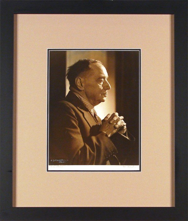Yousuf Karsh (1908-2002) Armenian/ Canadian: H. G. WELLS, silver gelatin print, mounted to card with artist's stamp on verso of card, signed in white ink and in pencil, sight 13 ¼ x 10", framed with glass, 5" L-shaped scratch from ear down thro