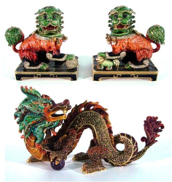 Decorative Arts: Jay Strongwater (three): DRAGON; FU LION WITH CUB; FU LION, three cast metal sculptures with hand-painted enamel and inlaid crystal, all three stamped and Dragon signed, each 4 ¾" tall. (3)