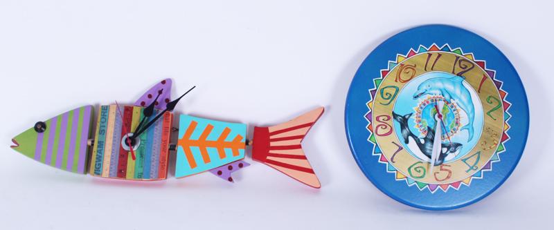 Wall Clocks: Fish Clock & Chuck Burright Cheeseball: BIG FISH RALPH, painted wood constructed with mixed media, signed and dated 9-07 and titled on verso, overall 20 ½” long 6 ¾” tall excluding clock hands; DOLPHIN AND WHALE, print