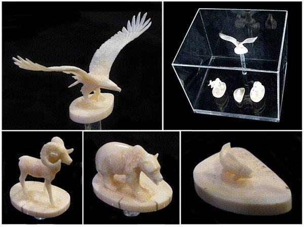 Antique Ivory Miniature Animals: A set of four miniature antique Ivory statuettes, ½" to 2 ¼" tall, mounted in designed Plexiglas case, eagle with some feathers losses, all with some repair.