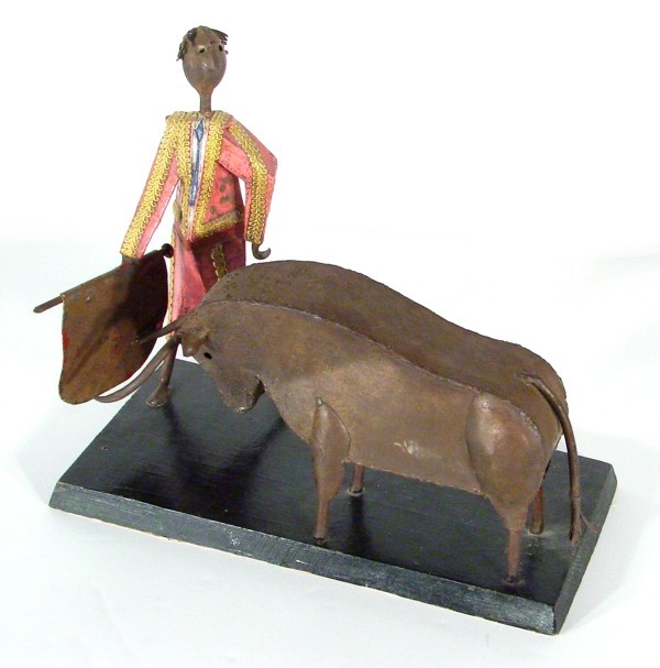 Manuel Felguerez (b. 1922) Mexican: MATADOR & BULL, polychrome enameled metal sculpture, signed, size 11 ½" tall, 15" wide, mounted to wood base, all the red paint is chipped off cape, exposed metal rusted, otherwise in good condition.