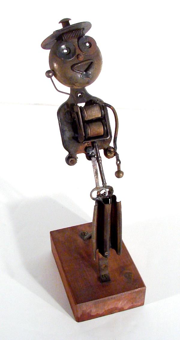 Nat Werner (1908-1991) American: MRS. ALEXANDER GRAHAM BELL, found object metal sculpture, 15 ¼" tall including wood base.